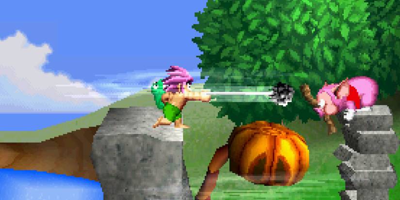 Fighting enemies in Tomba