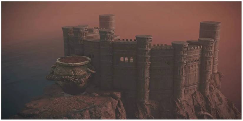 Giant pot in front of colosseum.