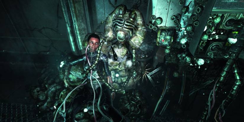 Person in tubes by creature.