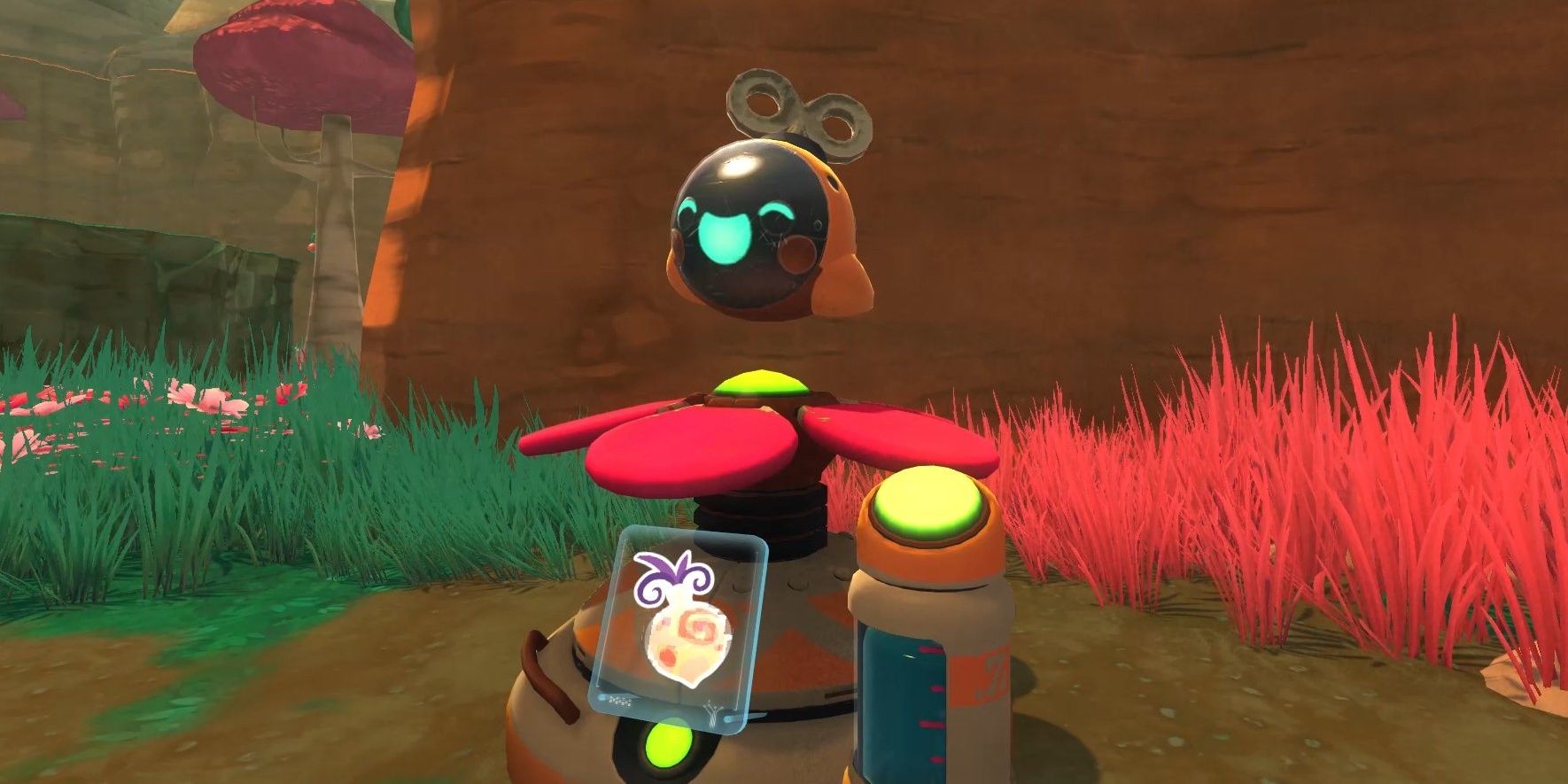 A happy Drone floats above its flower in Slime Rancher
