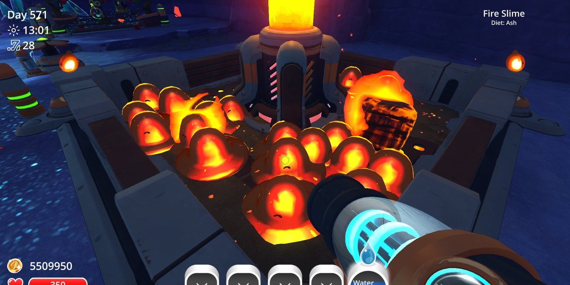 Fire Slimes sitting in the incinerator in Slime Rancher