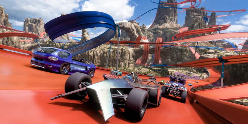 10 Hot Wheels cars driving on a Hot Wheels track in Forza Horizon 5