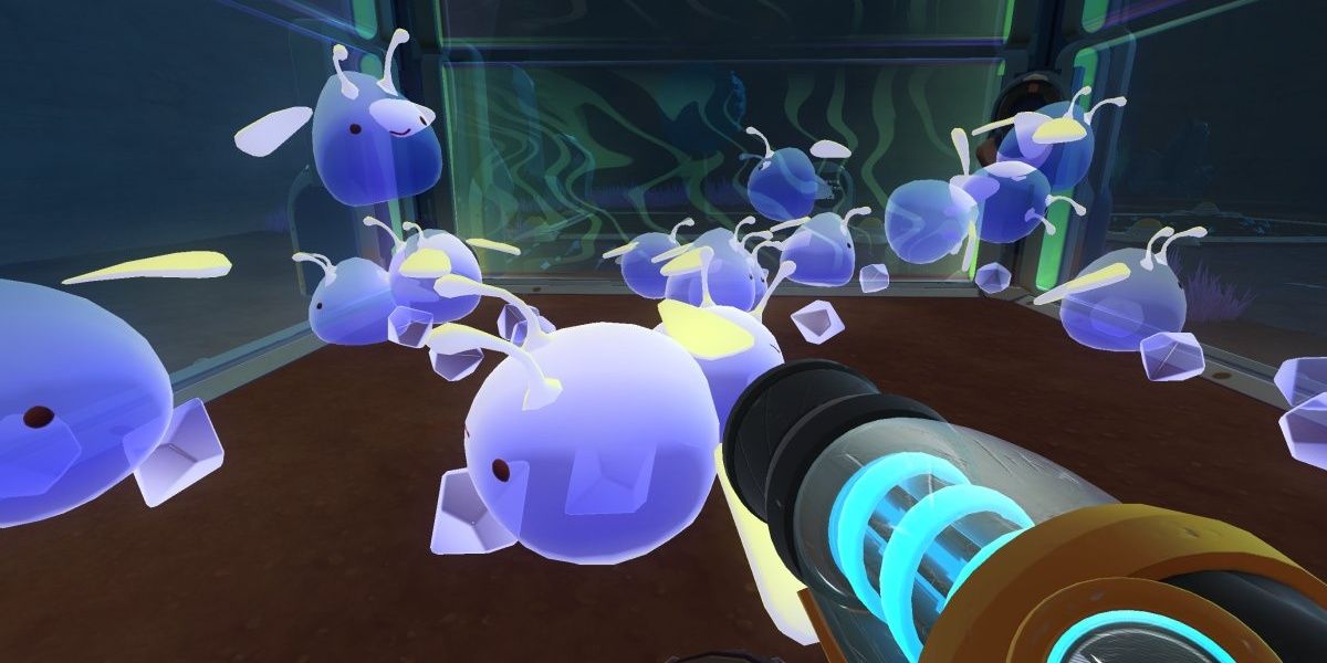 Phosphorus Slimes in a corral inside the cave in Slime Rancher