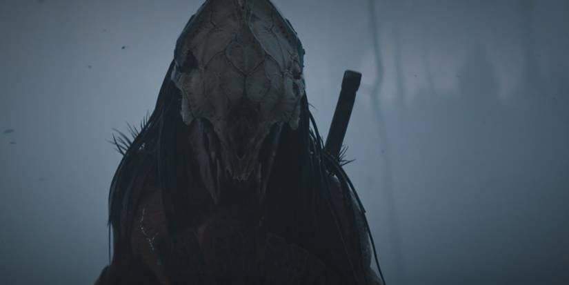 Predator holding his shield