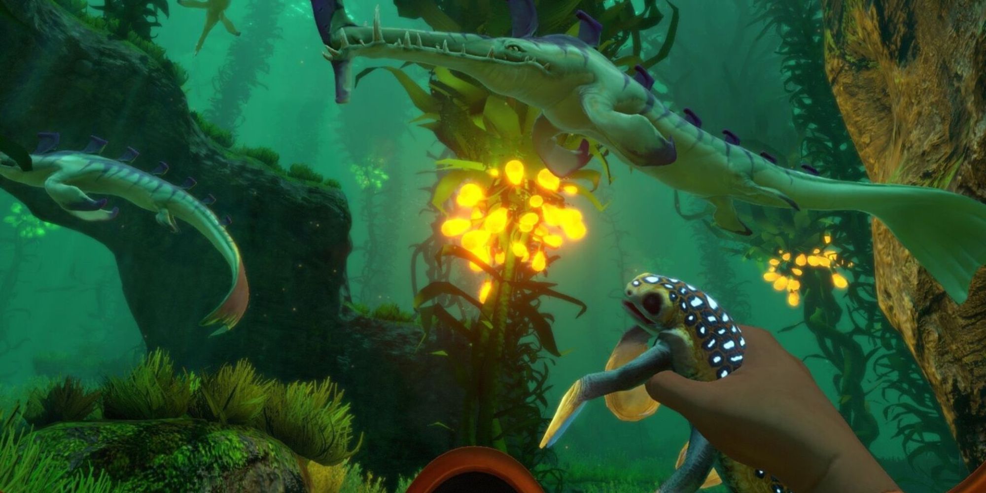 Player holding a frog underwater and using it to bait larger fish in Subnautica