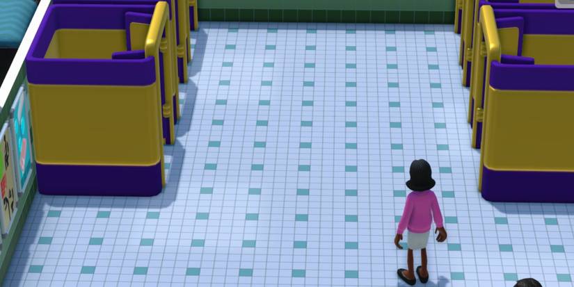 Two Point Campus Staff Member Using The Restroom