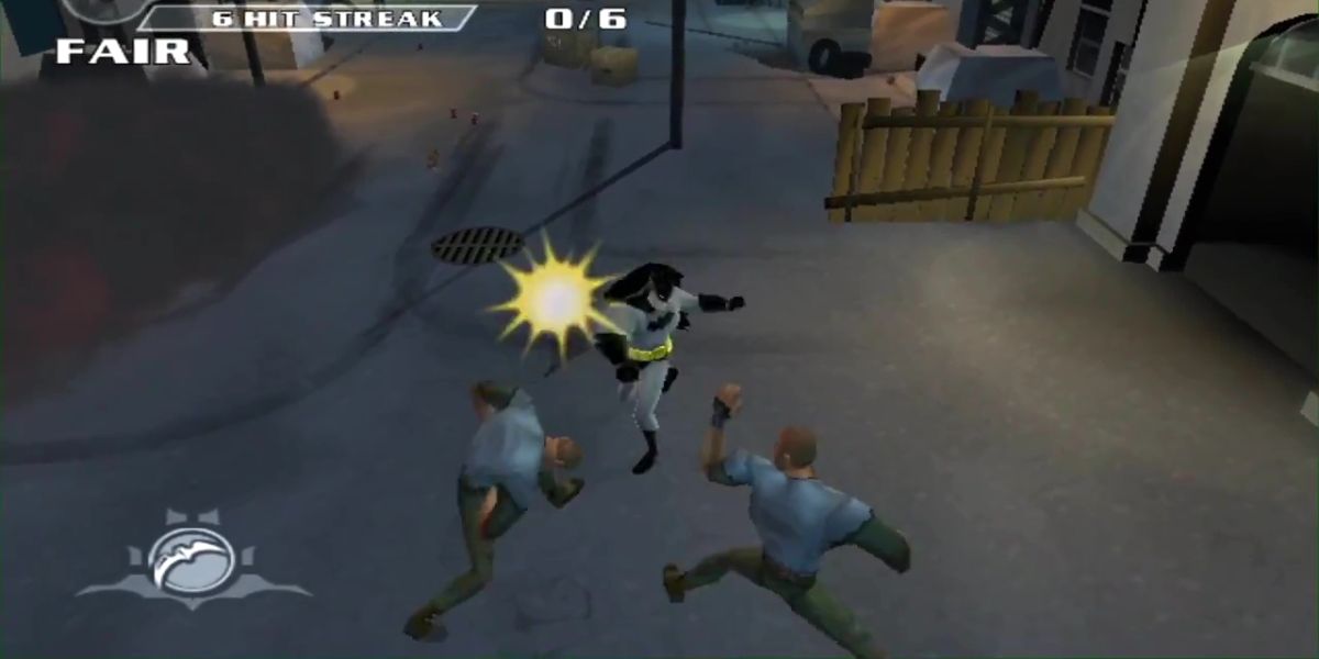 Batman fighting criminals in a dark alleyway in Batman: Rise of Sin Tzu