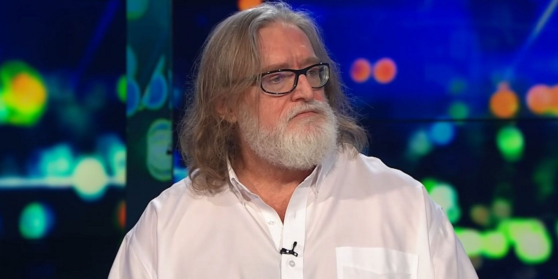 A photo of Valve CEO Gabe Newell wearing a white shirt.