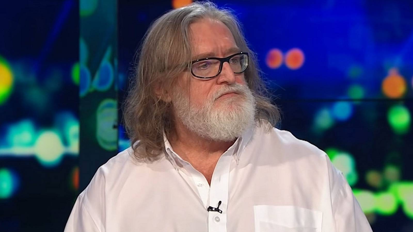 A photo of Valve CEO Gabe Newell wearing a white shirt.