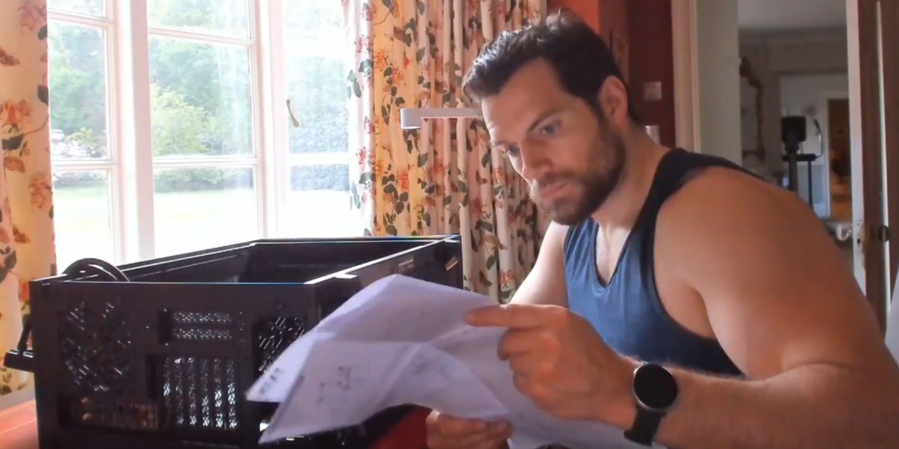 Because you definitely want to watch Henry Cavill build a gaming