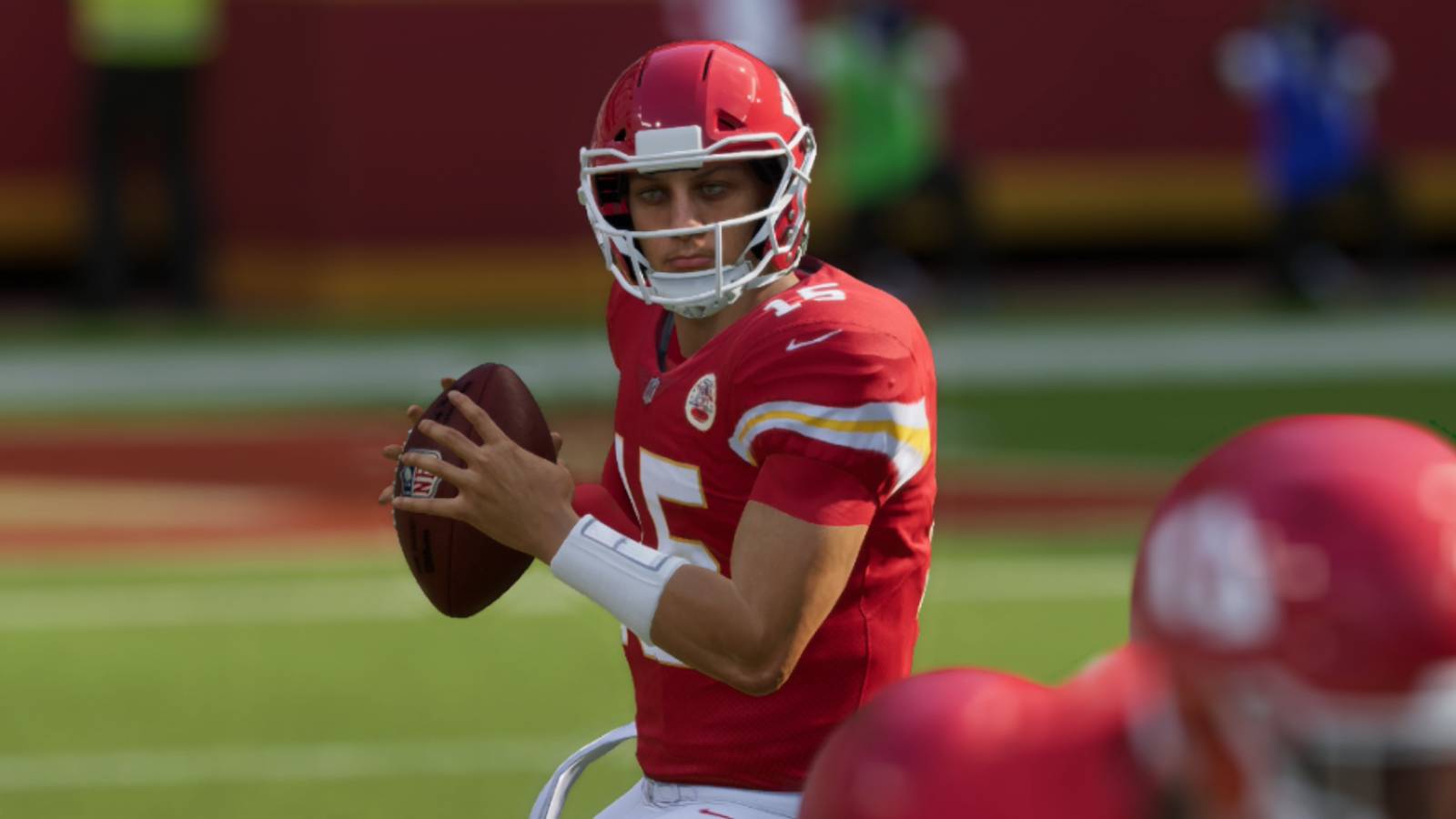 image of a madden nfl 23 player trying to pass the ball.