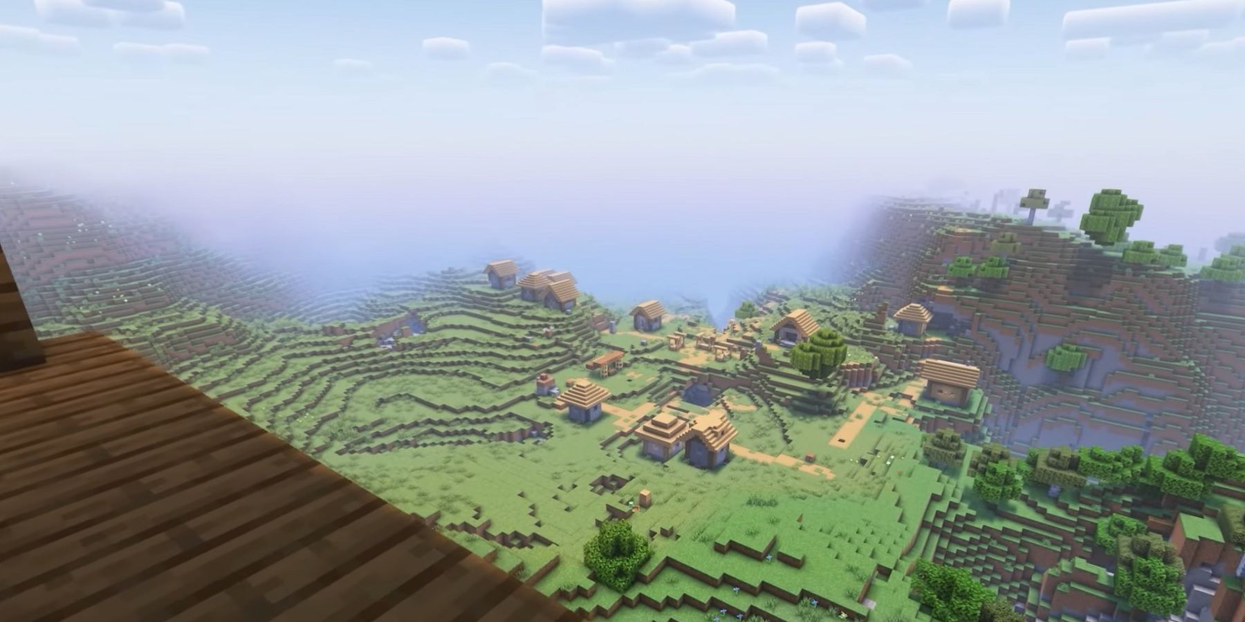Screenshot from Miencraft showing a village off in the far distance.