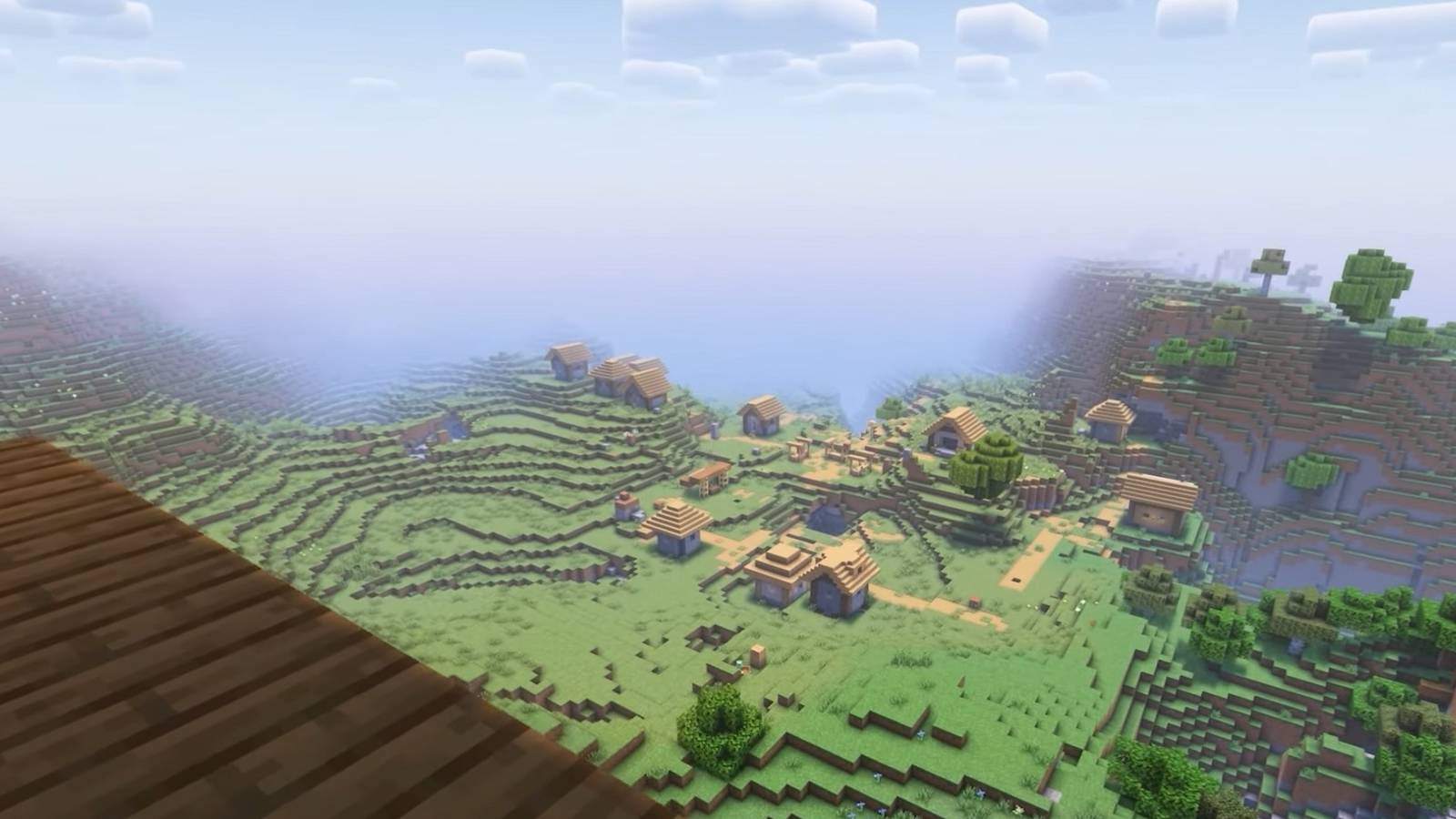 Screenshot from Miencraft showing a village off in the far distance.