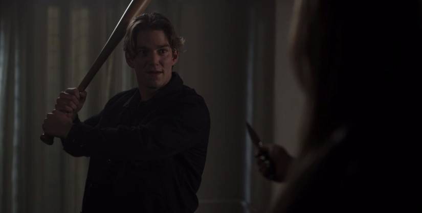 Paul (Nico Greetham) with baseball bat in American Horror Stories' "Drive"