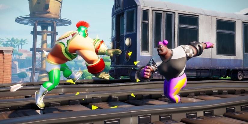rumbleverse players about to fight each other on a train track 