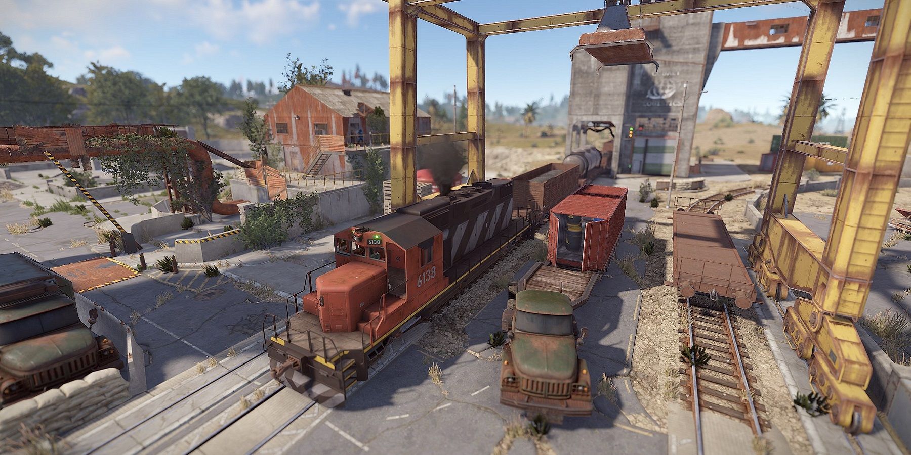 An image from Rust showing a couple of old trains on the above-ground railway system.