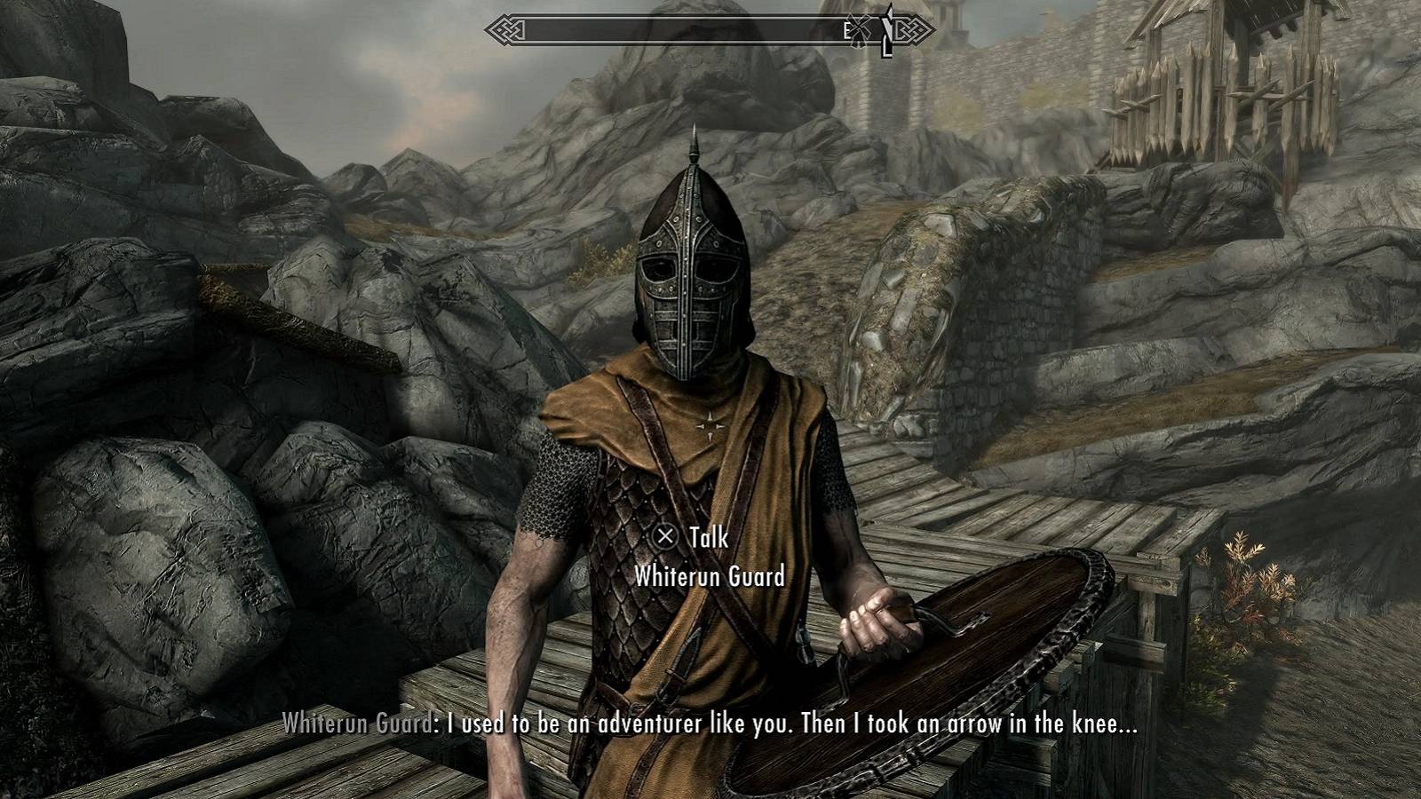 An image from Skyrim showing a Whiterun Guard talking about taking an arrow to the knee.