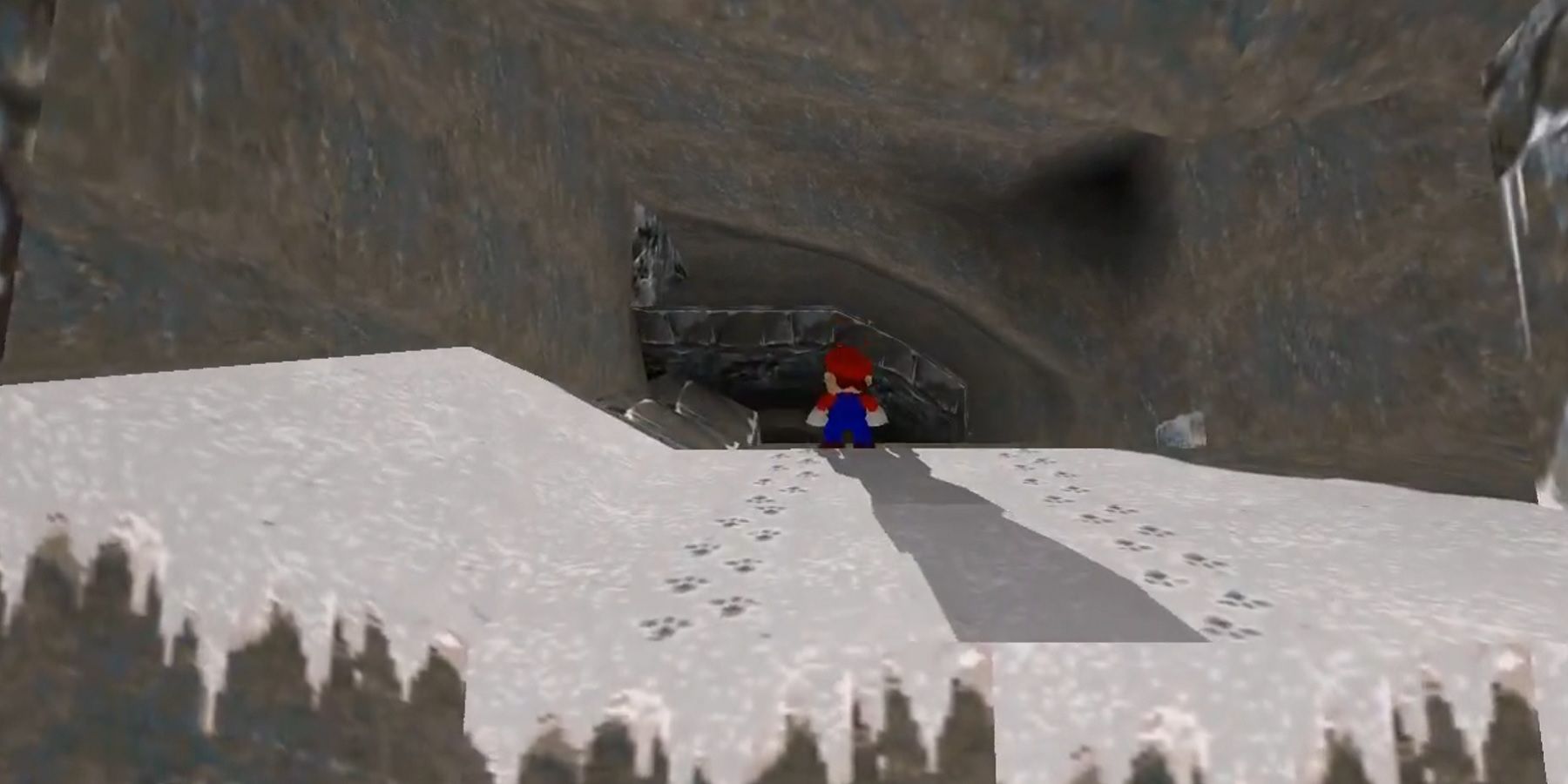 Screenshot from the original Tomb Raider game showing Mario entering a cave.