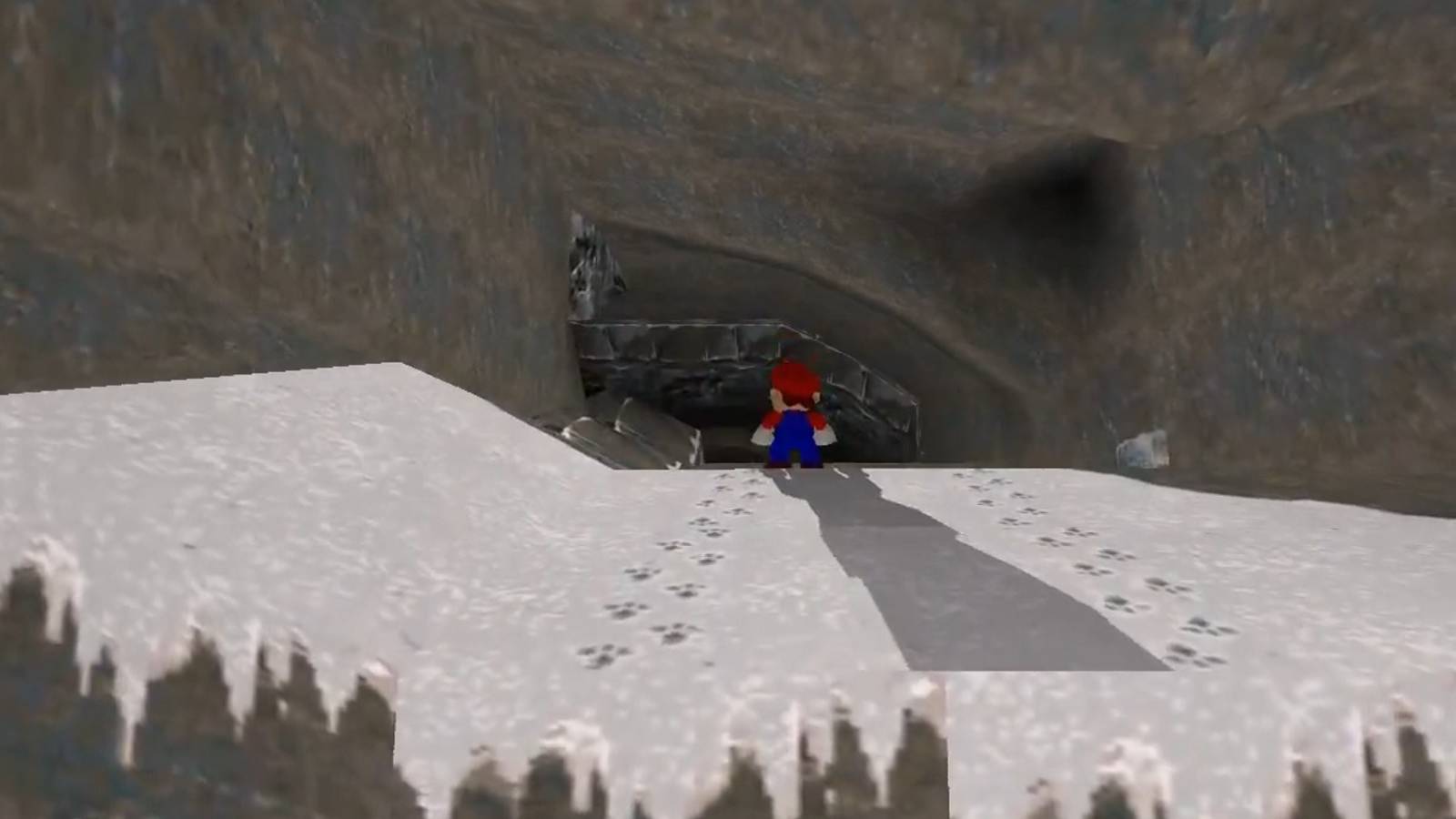 Screenshot from the original Tomb Raider game showing Mario entering a cave.