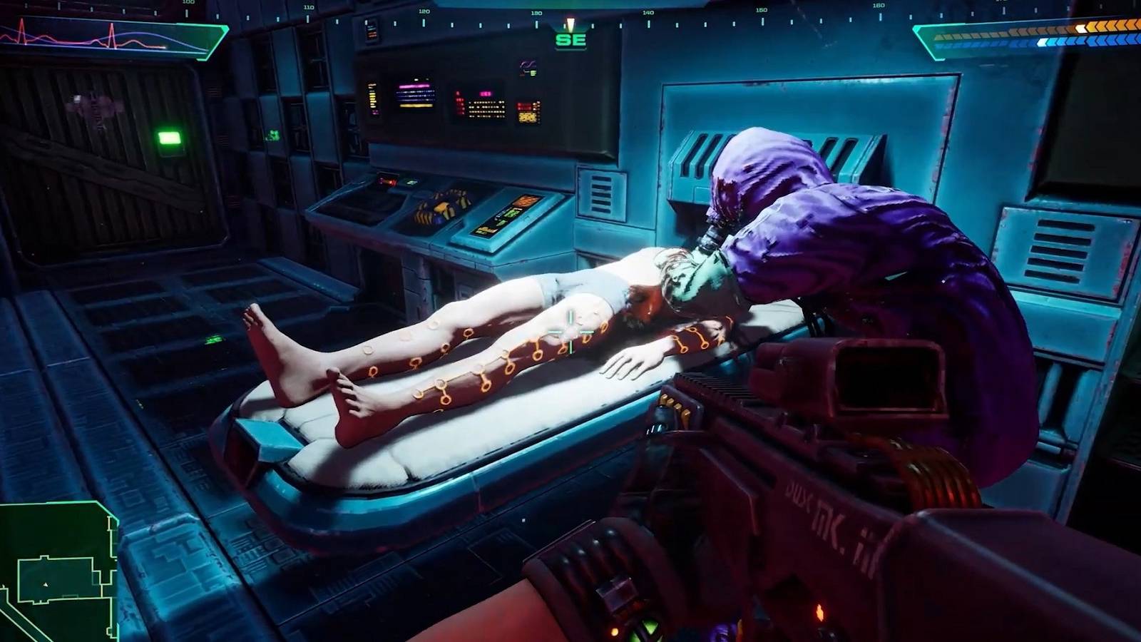 Image from the upcoming System Shock remake showing an NPC in a hazard suit tending to a body on a table.
