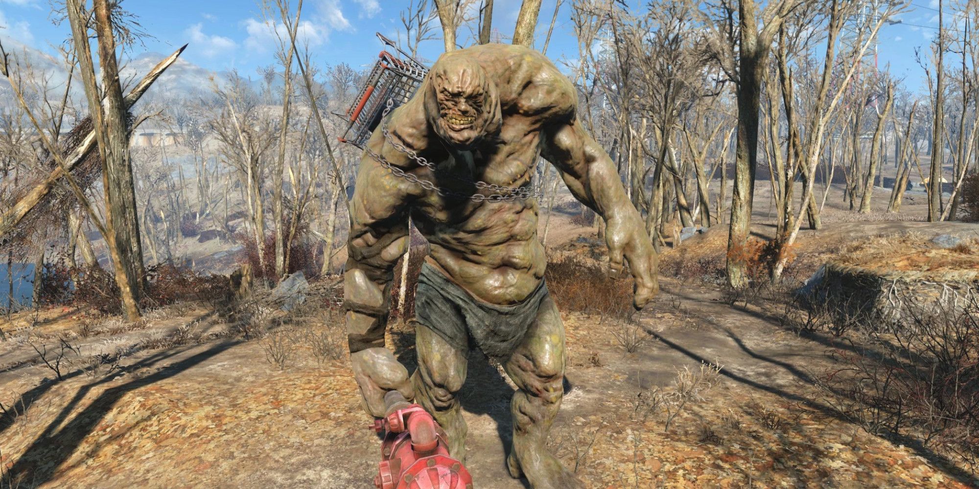A super mutant behemoth stands in the wasteland