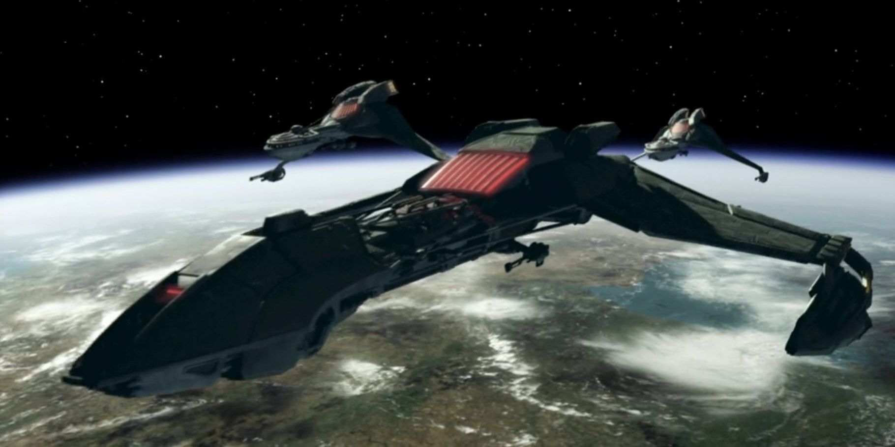 A Klingon ship flies through space in Star Trek