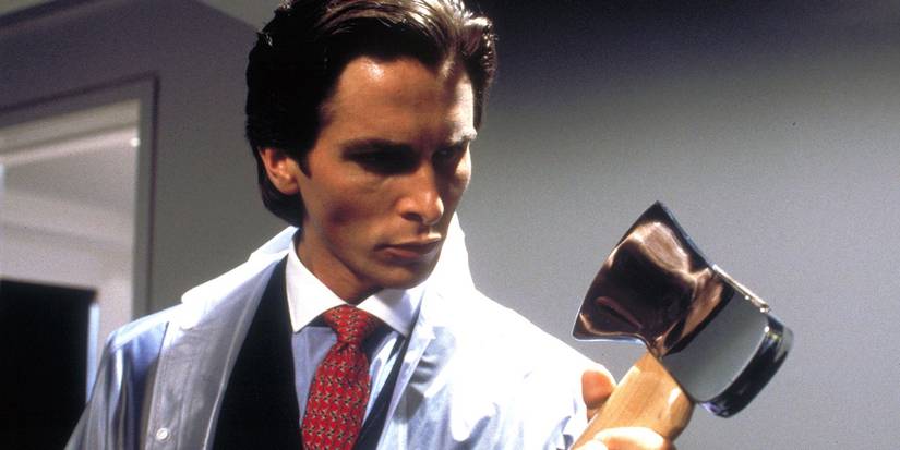 Patrick Bateman holding axe in American Psycho