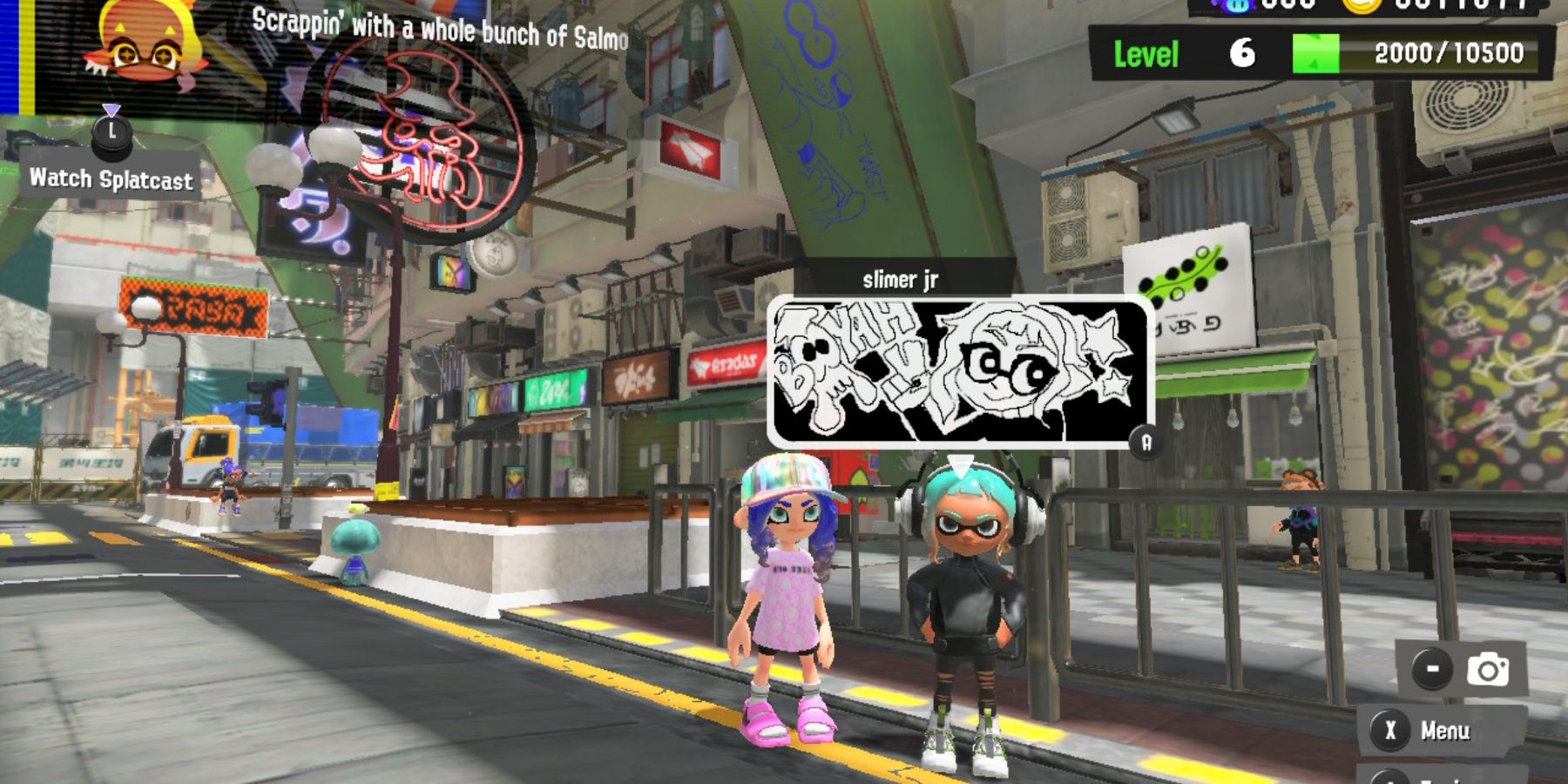 Player with art of a squidling saying "Booyah." 