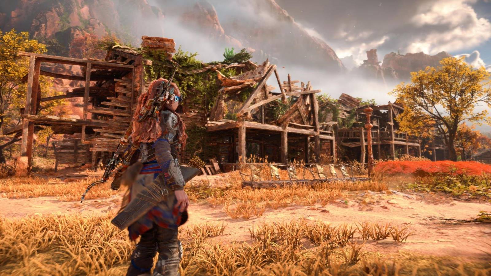 Aloy standing outside of the Horizon Forbidden West Relic Ruin in the Daunt