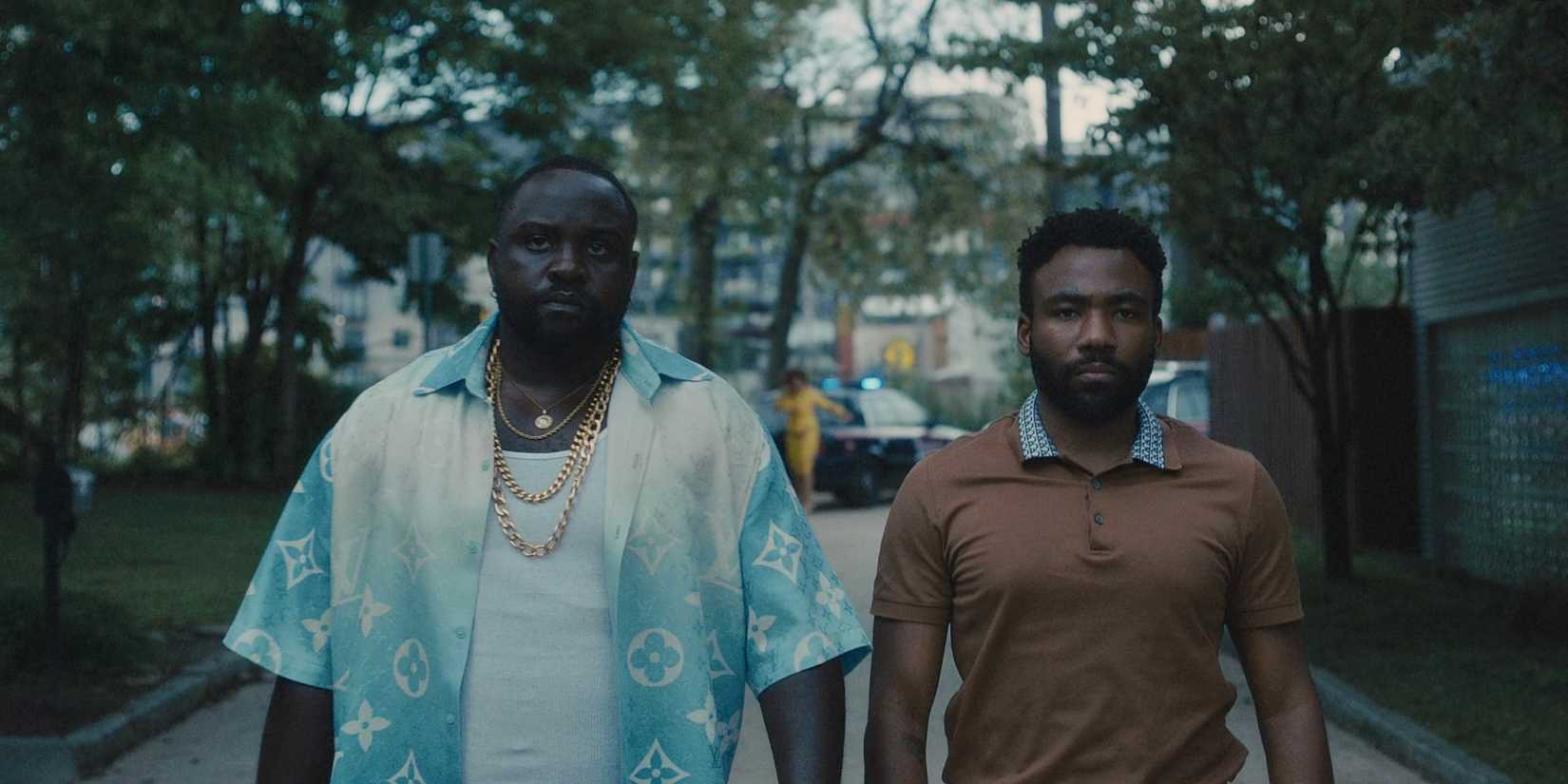 Donald Glover as Earn and Brian Tyree Henry as Al walking in Atlanta season 4