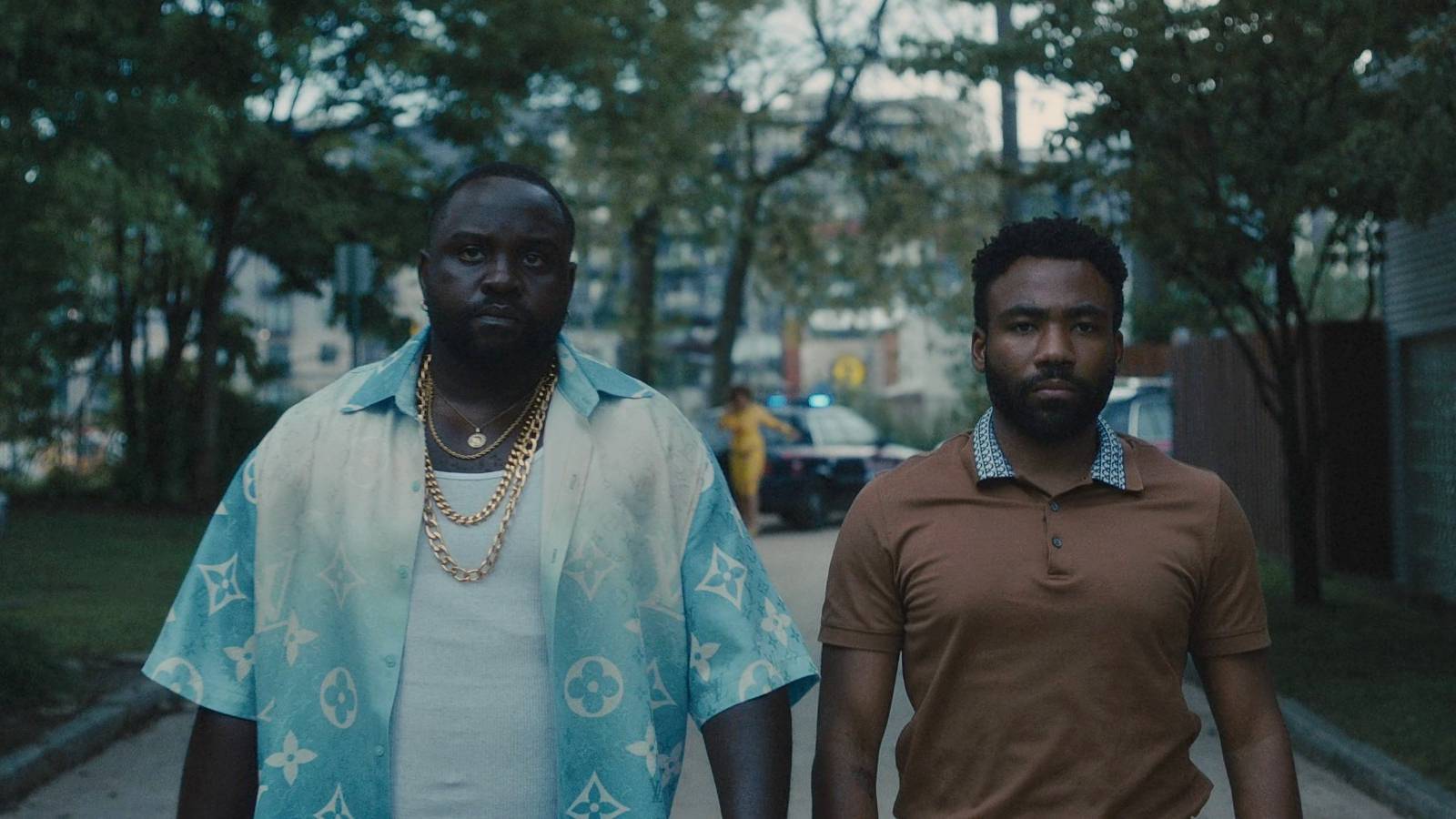 Earn and Al walking in Atlanta season 4