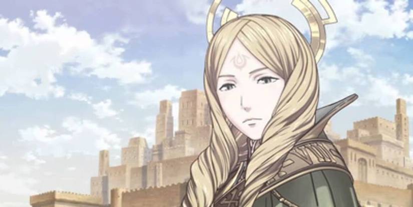 A young blonde woman with a crown and a tatoo on her forehead standing in front of a town