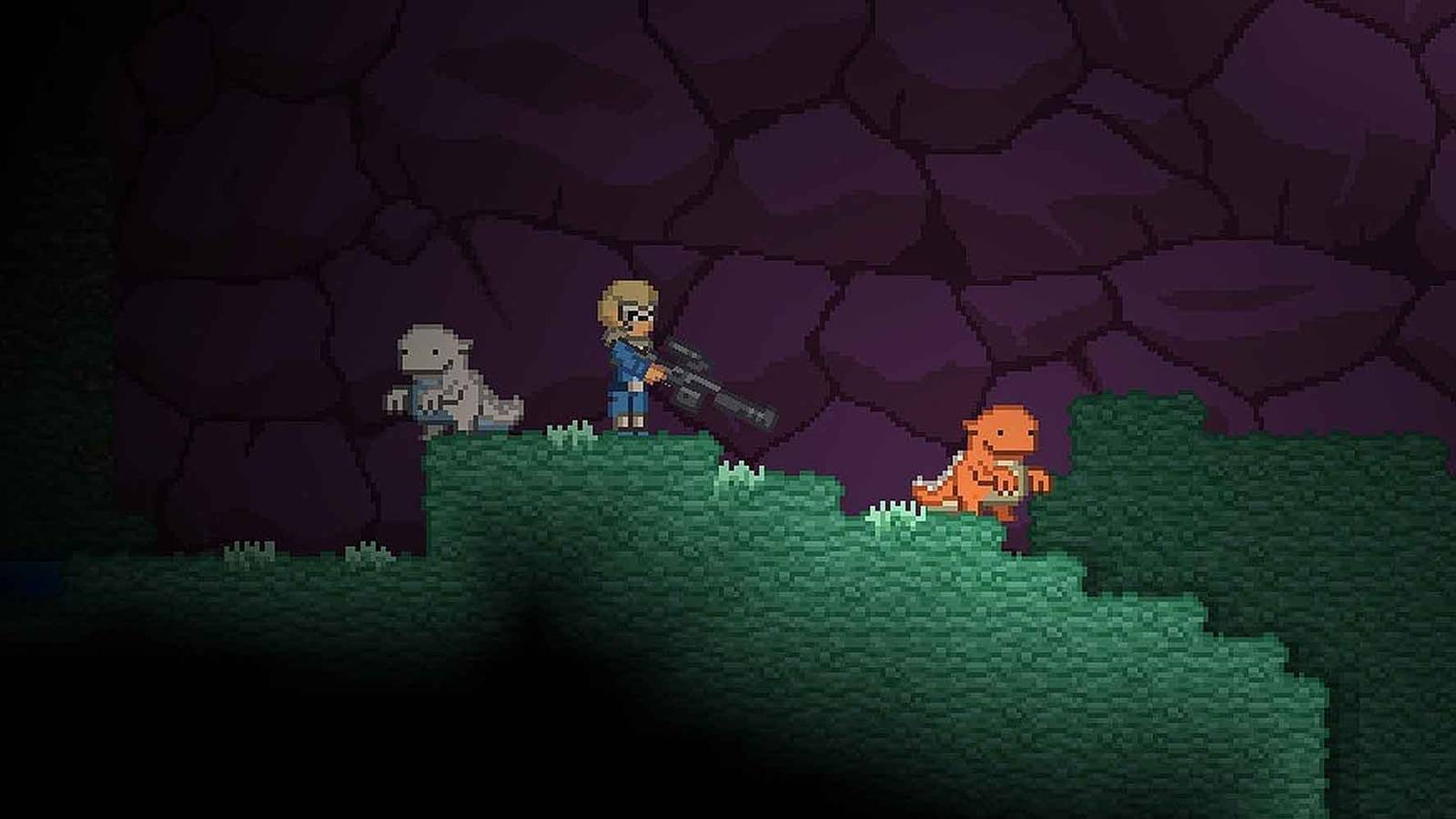 Exploring a dark cave with two pets in Starbound