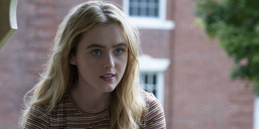 Kathryn Newton sitting outside in a promo still