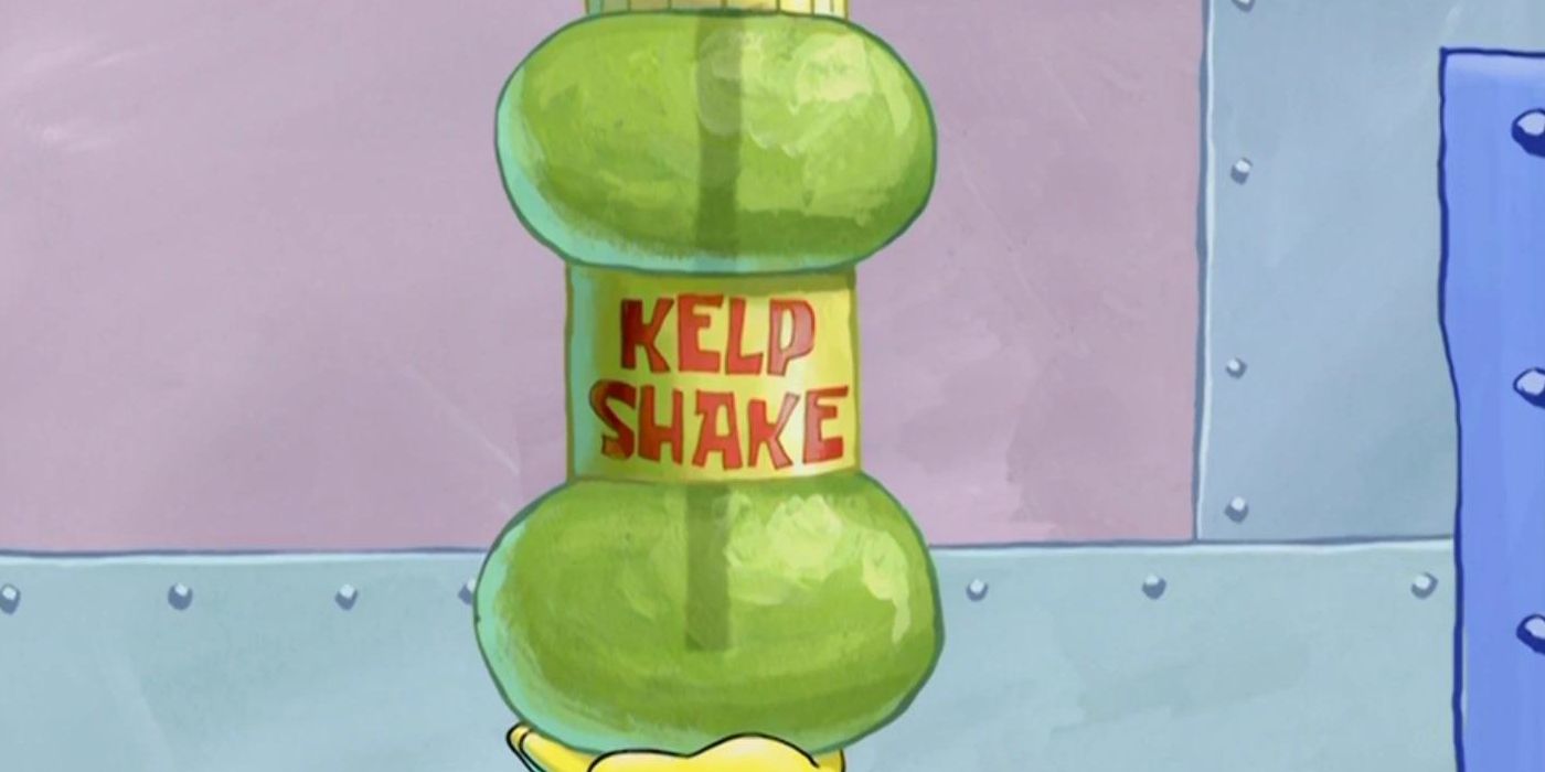 An hourglass-shaped, translucent green bottle with a yellow label reading "KELP SHAKE" in red, all-capital letters, against the background of the metal wall of the Krusty Krab. Image source: Reddit.com