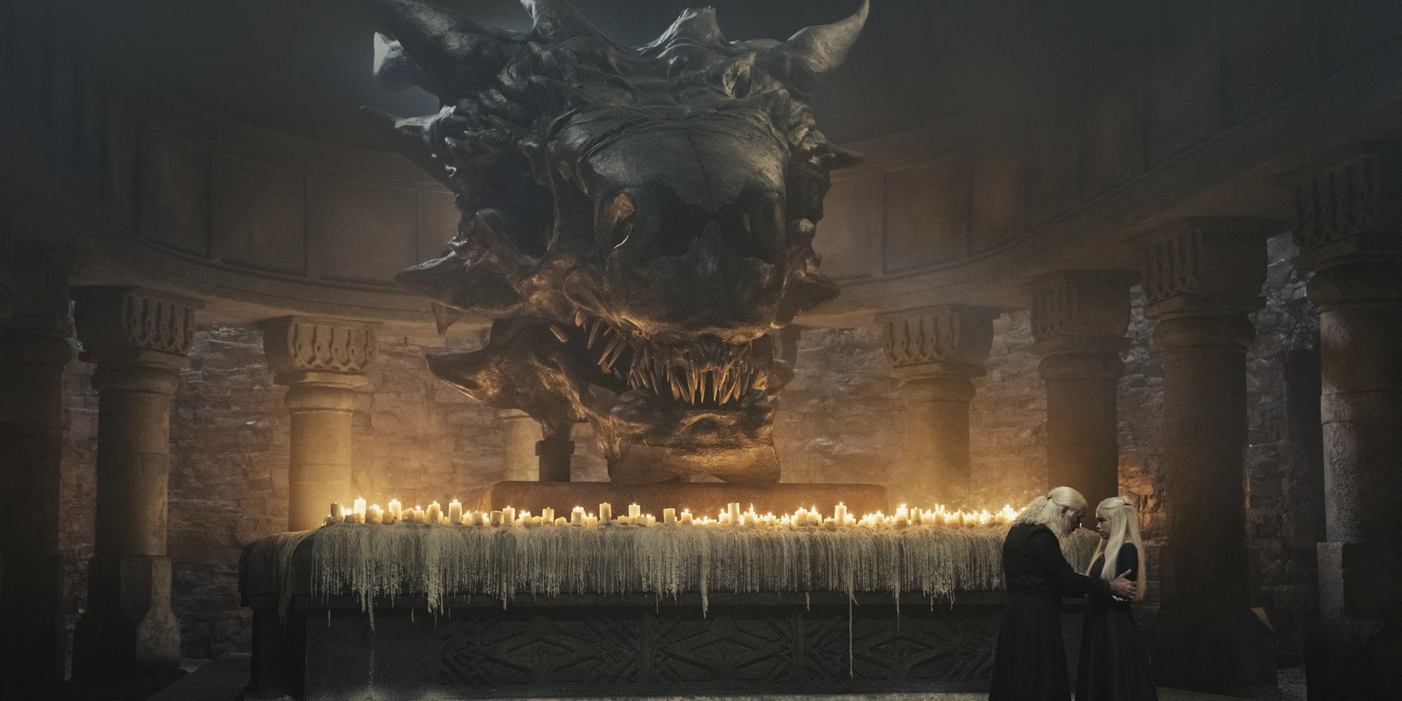 King Viserys and Rhaenyra talk near Balerion's skull in House of the Dragon.