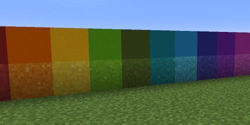 Concrete on top of concrete powder blocks in a rainbow of colours in Minecraft