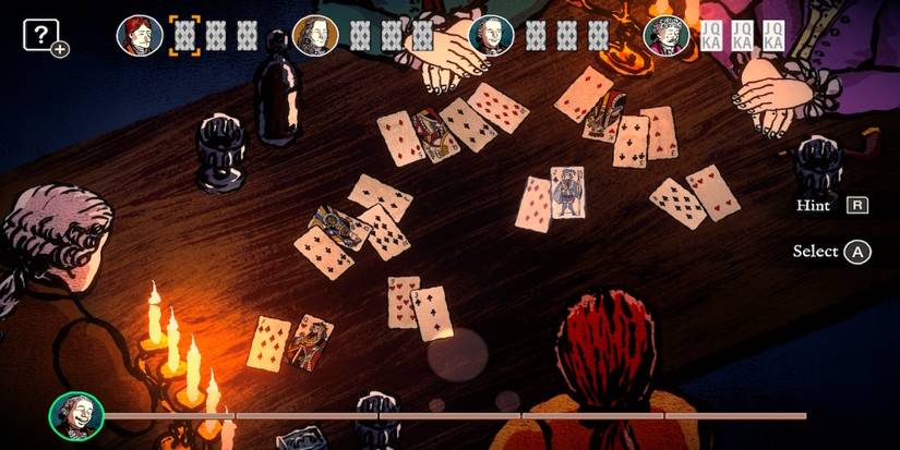 Playing a card game in Card Shark on dimly lit middle ages table