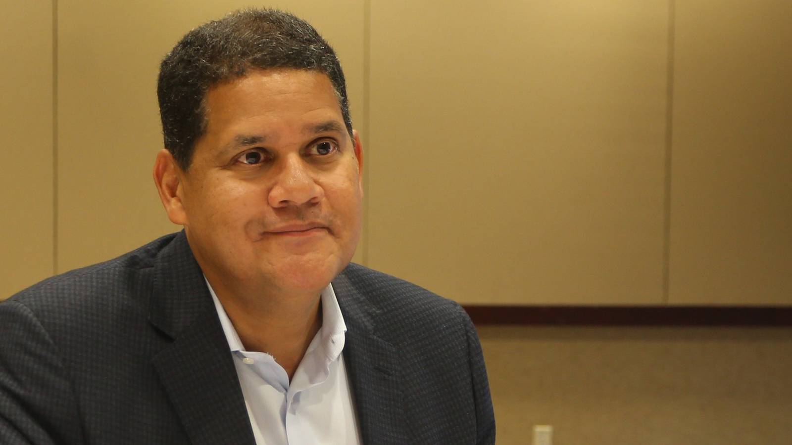 reggie speaks with execs after retiring