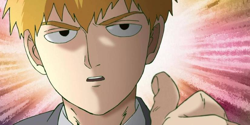 A man with orange hair pointing at himself dramatically