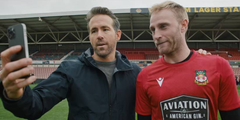 Ryan Reynolds taking selfie with Wrexham goalkeeper Rob Lainton
