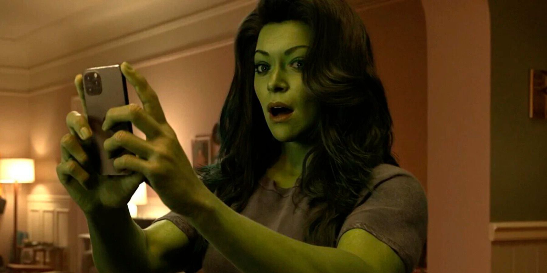 She-Hulk checking phone surprised 