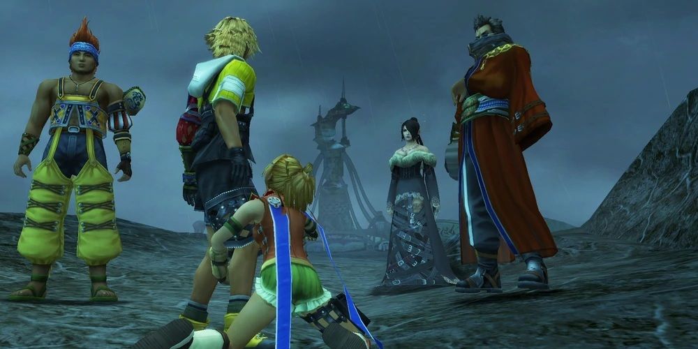 A frightened Rikku clings to Tidus as Wakka Lulu and Auron watch in Final Fantasy 10