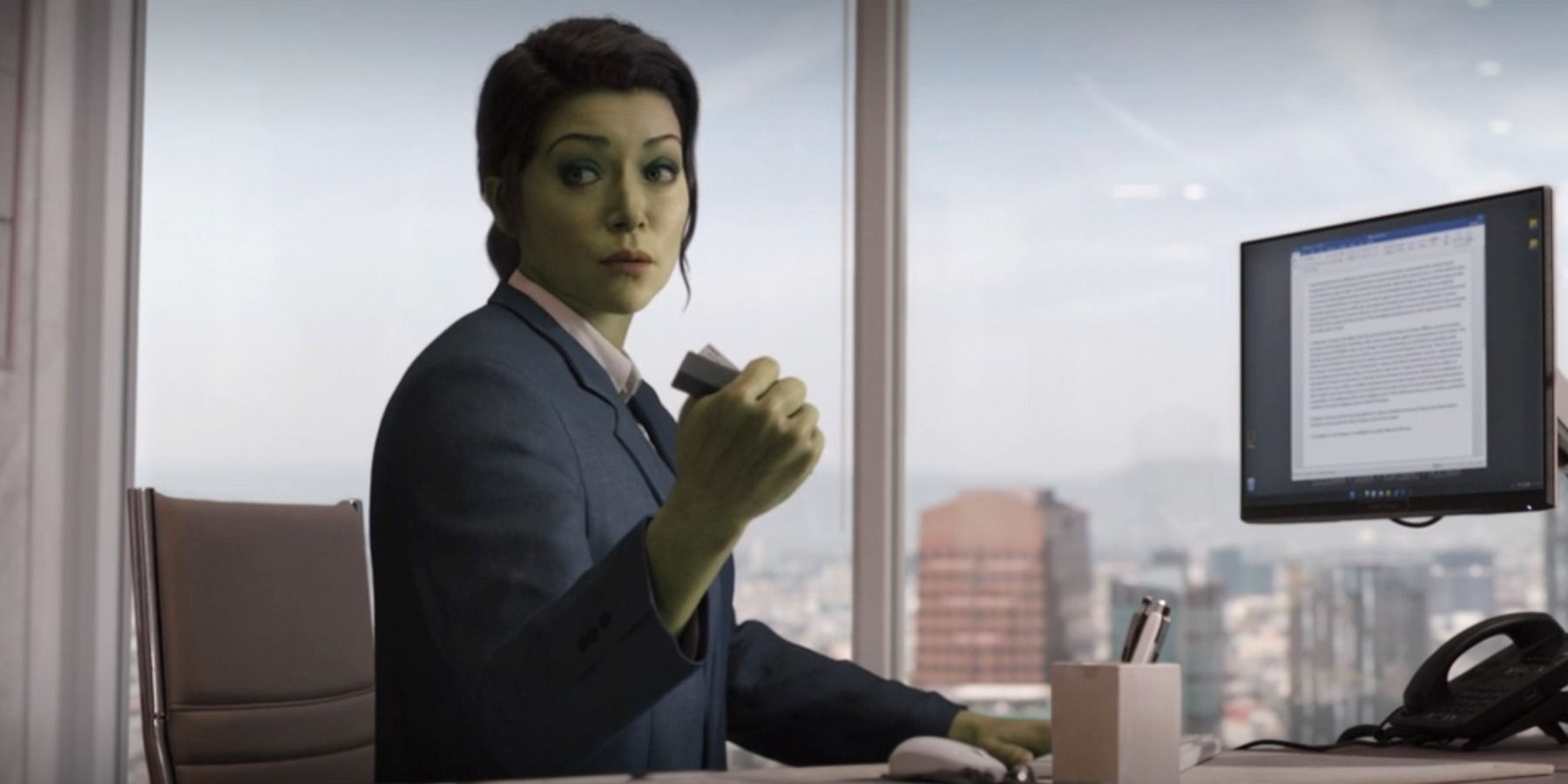 She-Hulk crushing stapler in office