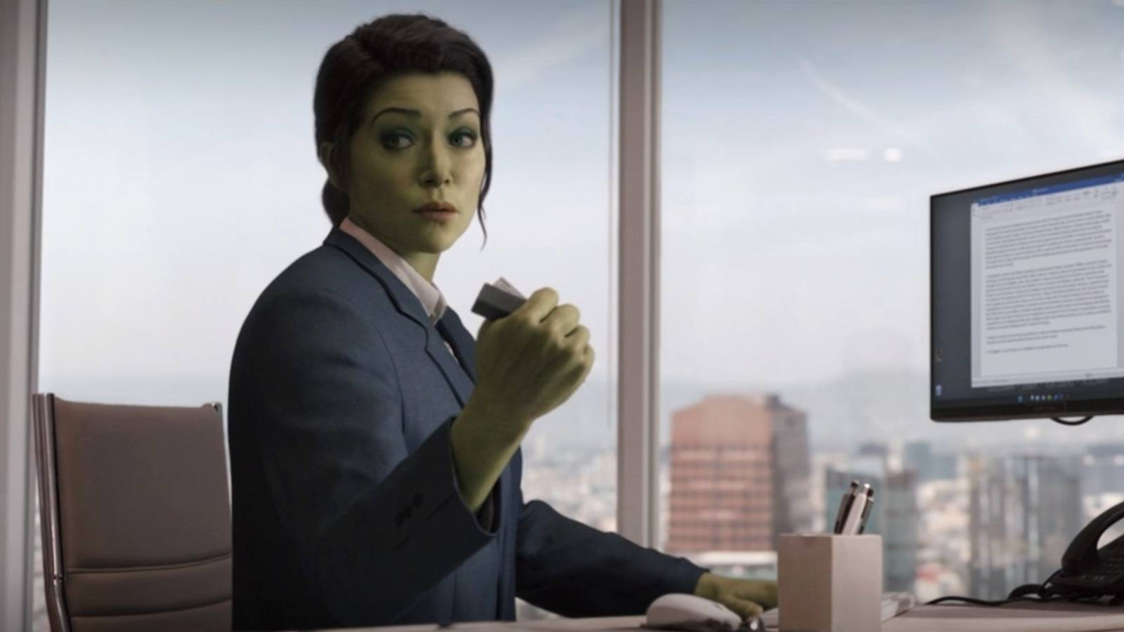 She-Hulk crushing stapler in office