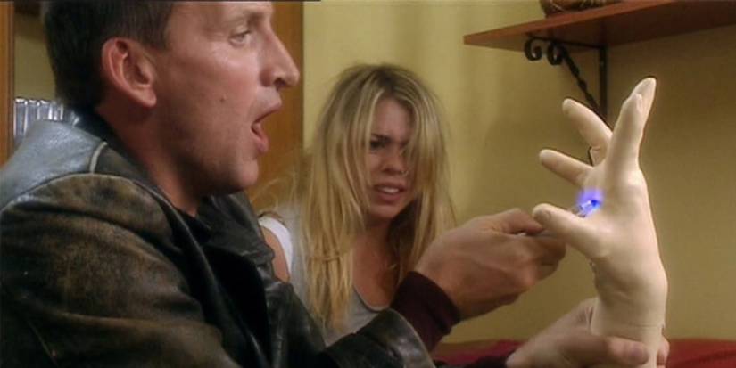 The Ninth Doctor uses his sonic screwdriver in Doctor Who