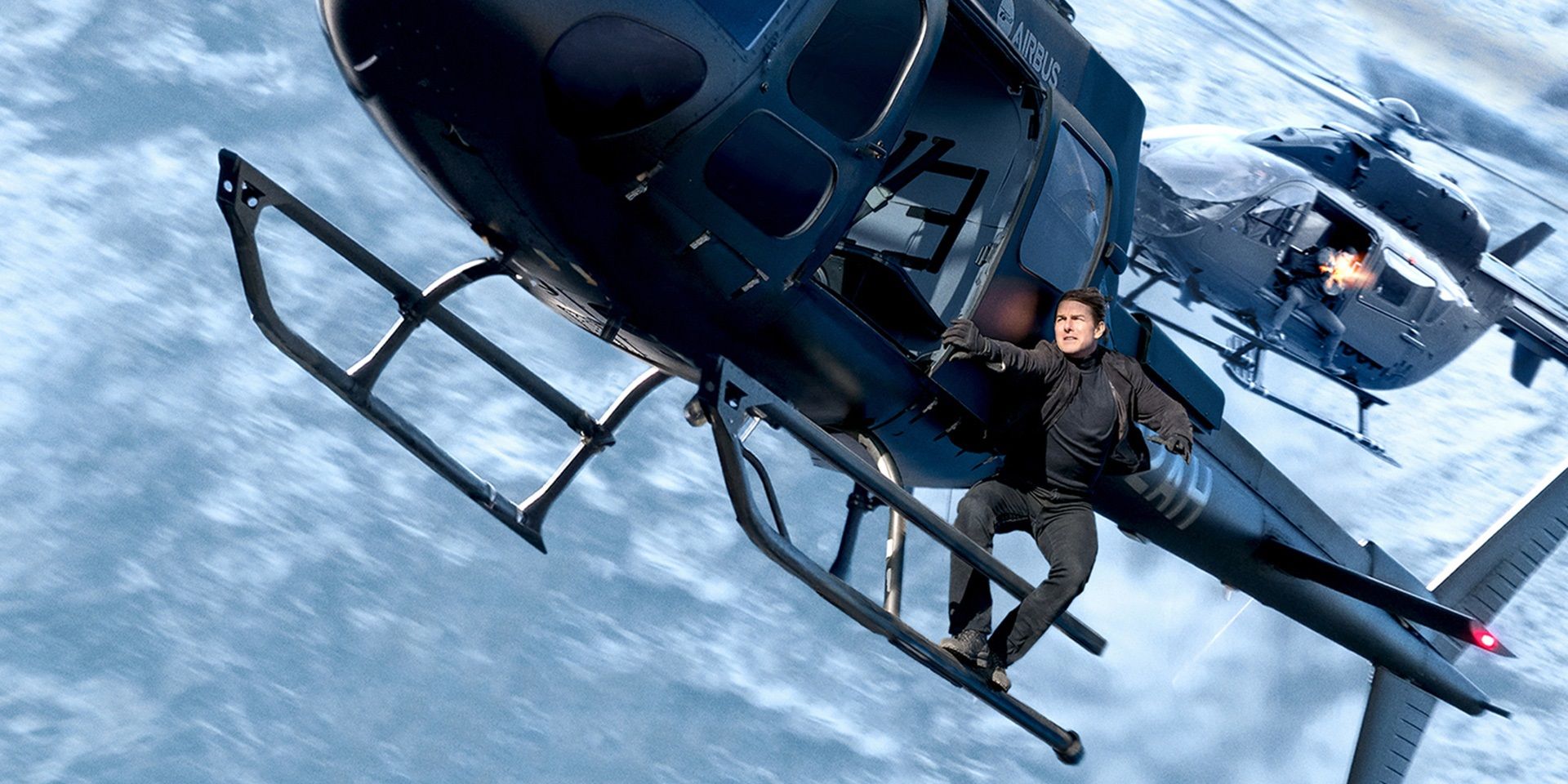 Tom Cruise hanging off a helicopter in Mission Impossible Fallout