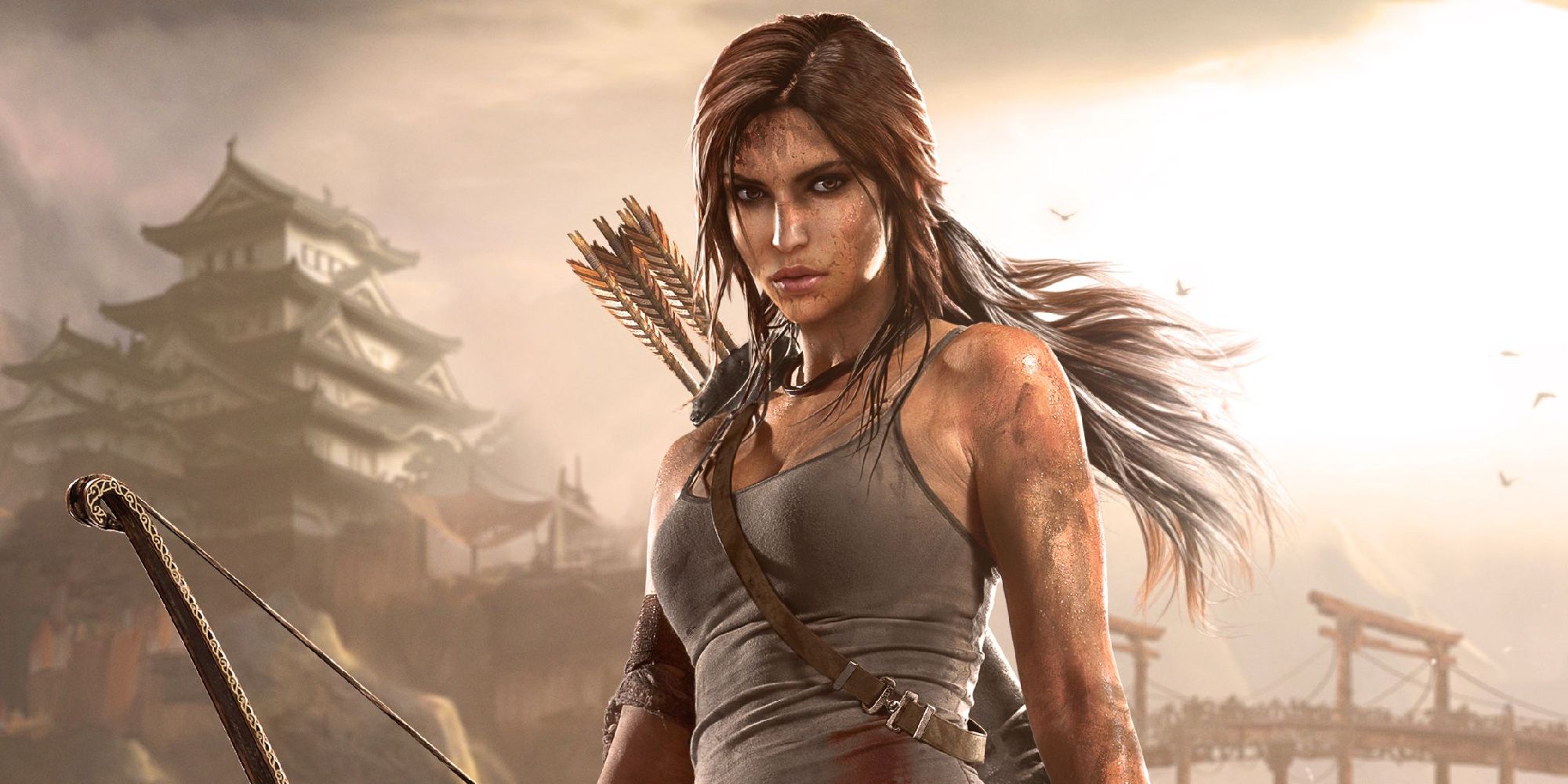 Lara Croft with her bow in a promo still from Tomb Raider 2013