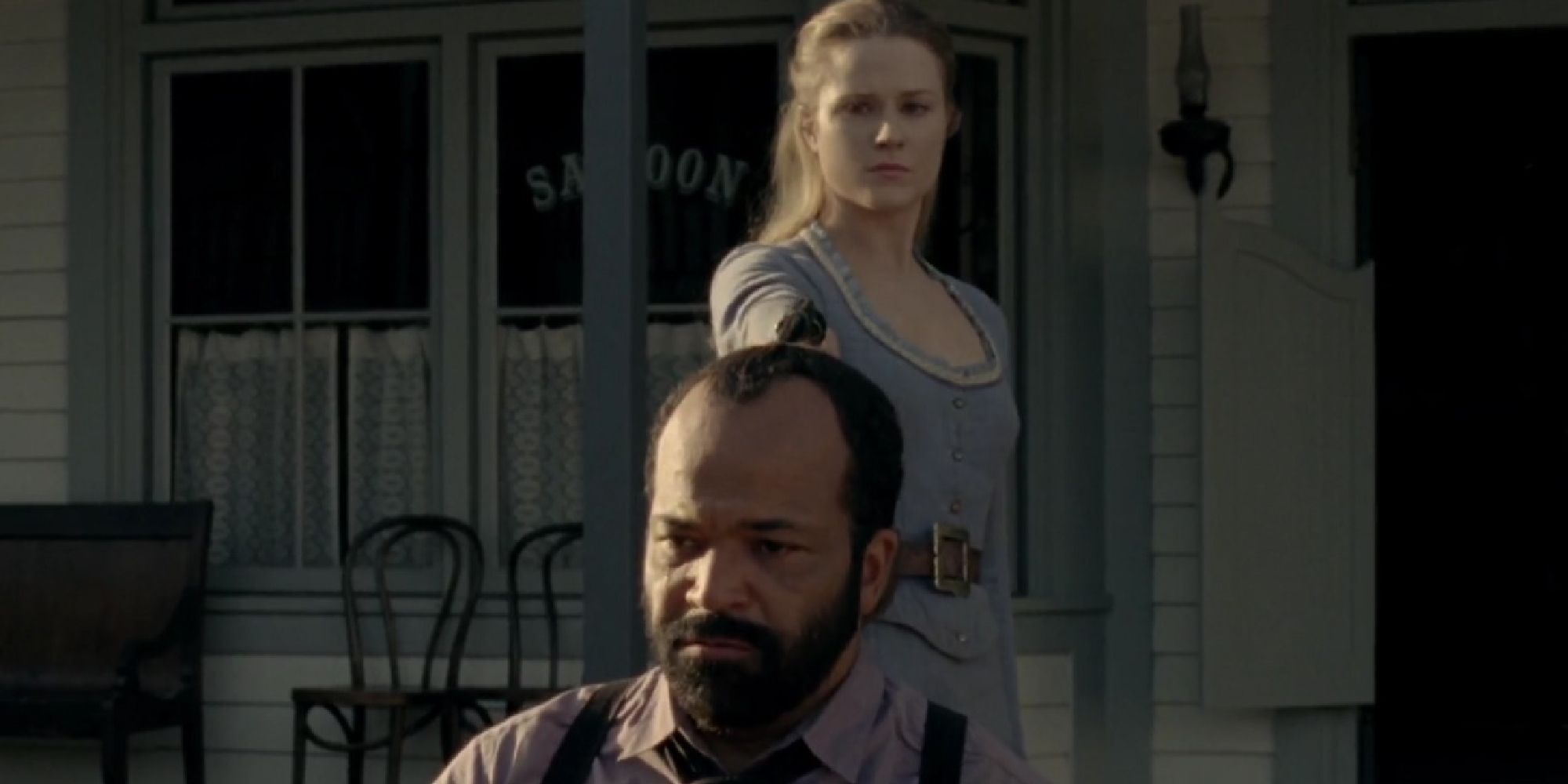 Dolores aiming a gun at Arnold's head in season 1 of Westworld