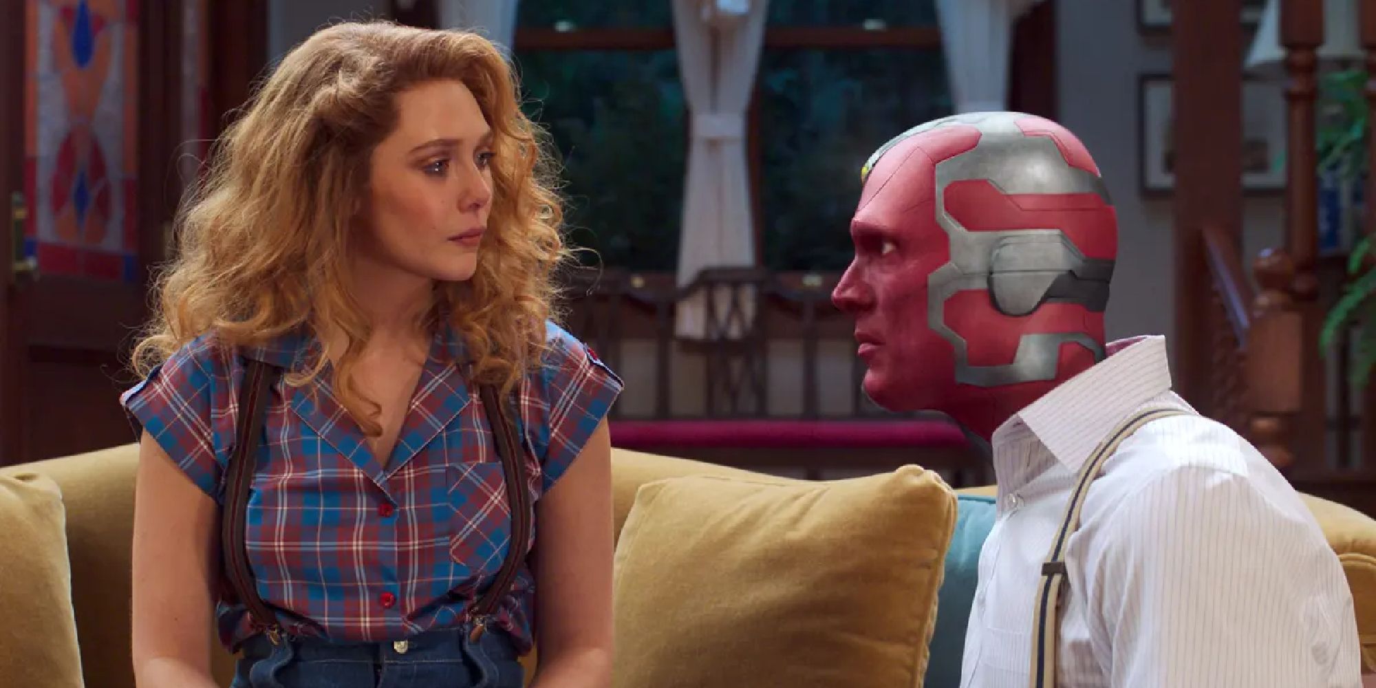 Elizabeth Olsen and Paul Bettany as 80's Wanda and Vision in "WandaVision"